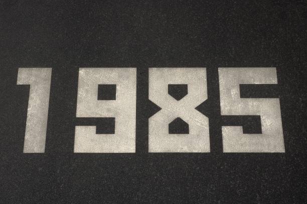 istock Black granite slab with white numbers 1985 on it 2177449381