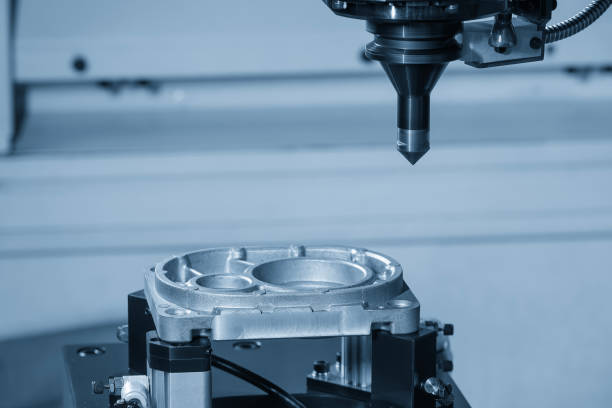istock The CNC milling machine chamfer cutting aluminum part by chamfer tool in the light blue scene. 2177449900