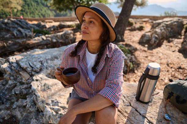 istock Woman Enjoying Coffee in Nature 2177451767