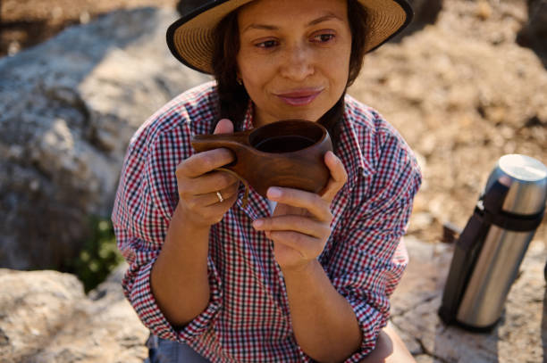 istock Woman Enjoying Outdoor Coffee Break 2177451773