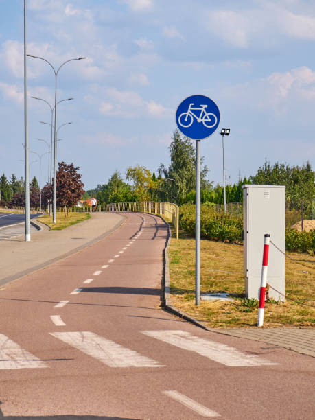 istock Bicycle lane on the street. The bike path is empty. 2177453814