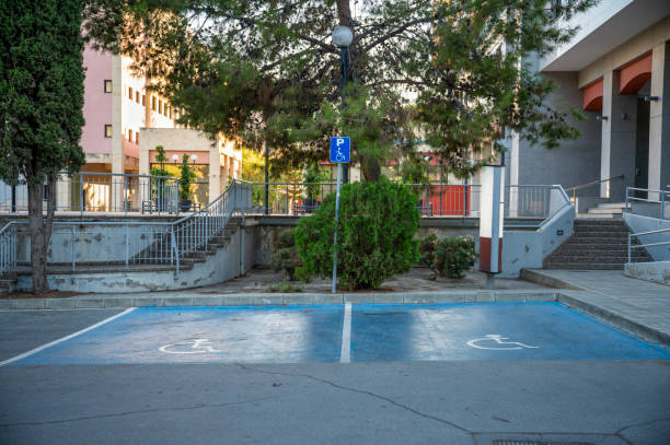 istock Parking places with handicapped symbol icon 2177454524