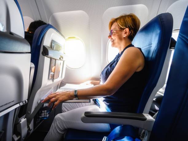 istock Mature woman on the airplane 2177455297