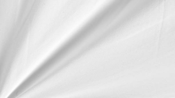 Smooth white silk bedsheets, soft and luxurious fabric, elegant blanket background