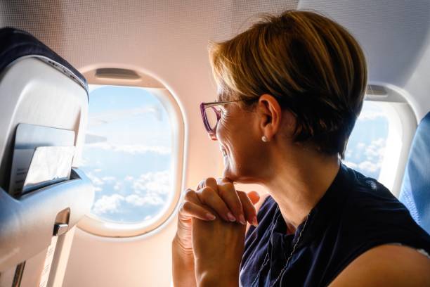 Mature woman on the airplane