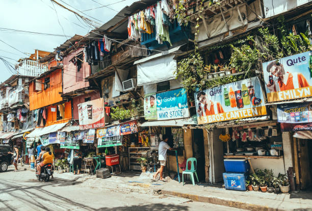 Metro Manila, Philippines - Aug 28, 2024: A typical squatter area in the city. A cramped slum area.