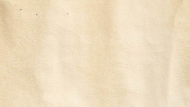 istock Crumpled Old yellow paper with folded crease 2177458422
