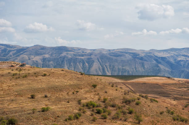 istock Majestic mountains under a blue sky filled with clouds, showcasing natural beauty and rugged terrain 2177459663