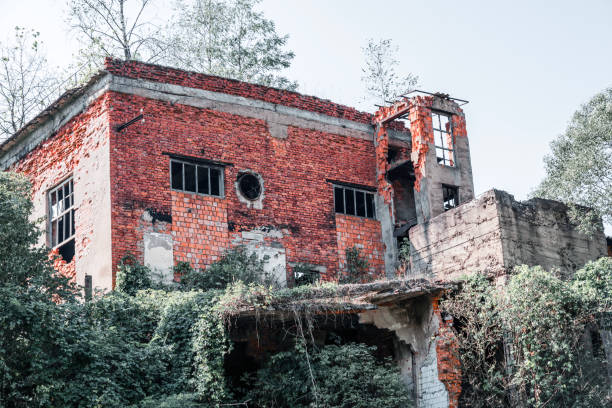 istock old brick building on the river bank, brick building, Der Verfall 2177460051