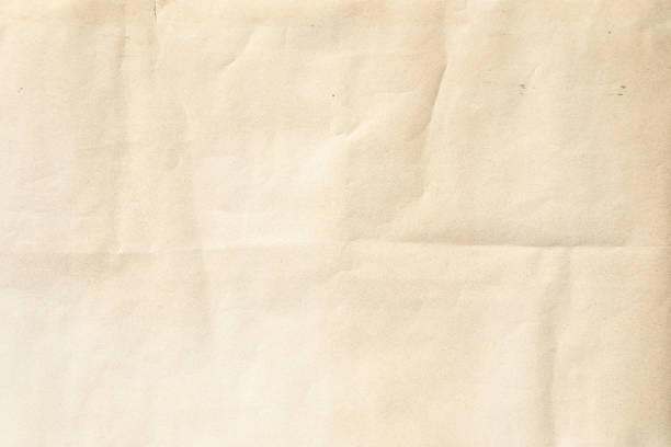 istock Crumpled Old yellow paper with folded crease 2177460551