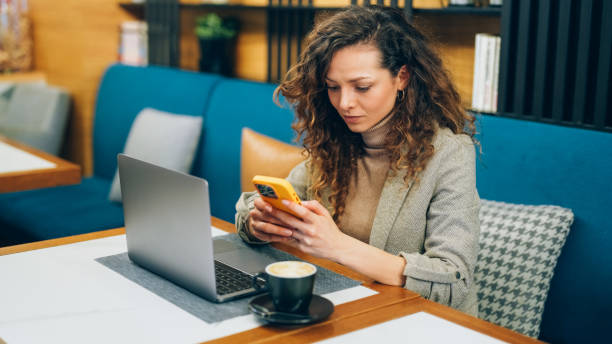 istock Businesswoman in cafe working on laptop 2177462733