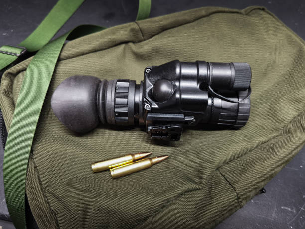istock Night vision monocular and 5.56x45mm cartridges. 2177462959