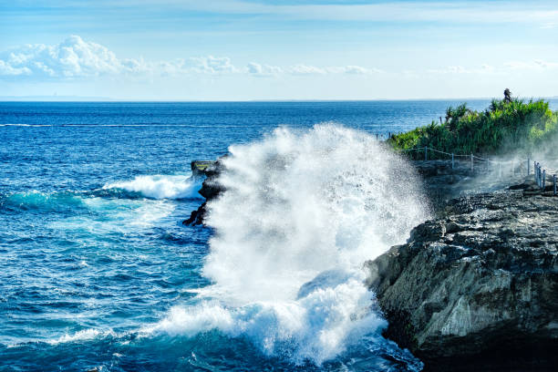 Rocky Coastline in Nusa Penida, Indonesia, showcasing the raw beauty and dynamic ocean landscape.