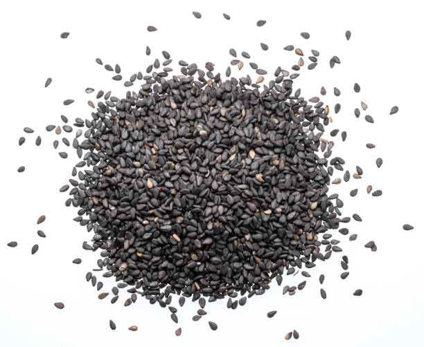 istock Heap of black cumin seeds isolated on white background. Top view. 2177466224