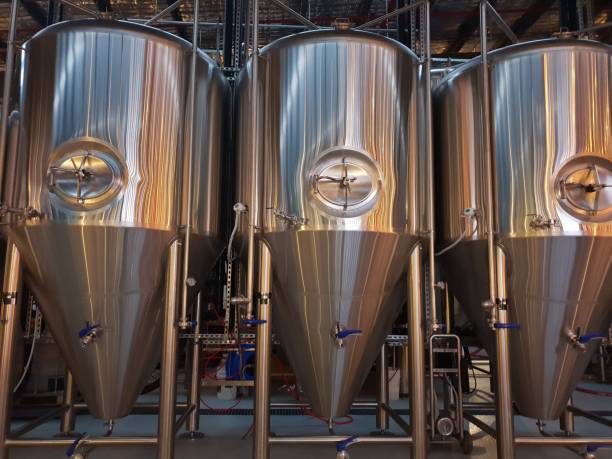 istock Giant beer kegs in a brewery. 2177466325