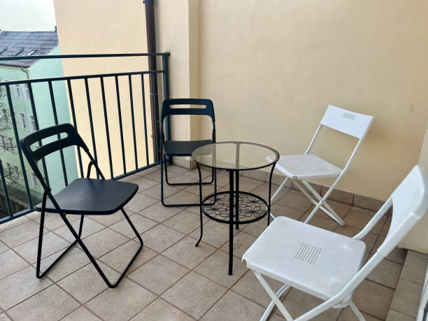 istock Interior design: Beautiful terrace. Black and white chairs. Old town 2177469076