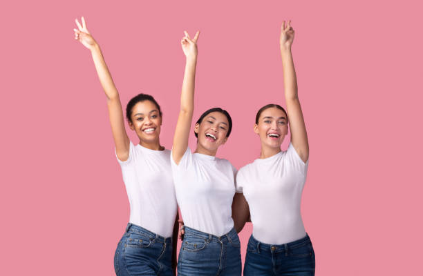 istock Three Joyful Millennial Girls Gesturing Victory Sign Posing, Studio Shot 2177474461