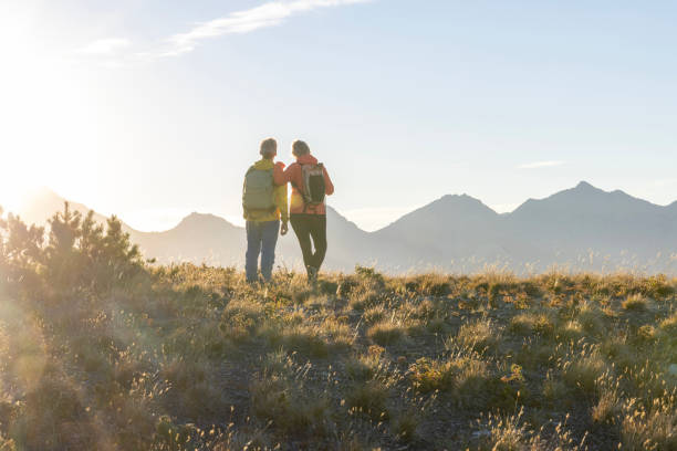 istock Mature couple watch sunset over mountains 2177478842