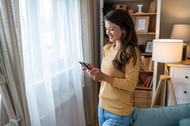 istock Young woman using cell phone 2177480645