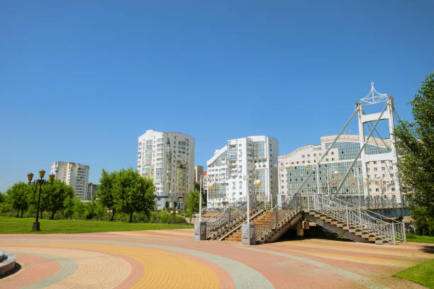 istock Belgorod cityscape. Pedestrian bridge over the river Vezelka. Belgorod State University hostel and left-bank residential neighborhood. 2177481741