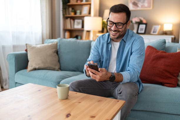 istock Handsome man enjoying in a free time in his home 2177482875