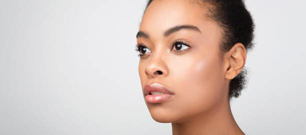 istock Sensual african young lady looking aside posing on gray background 2177484628