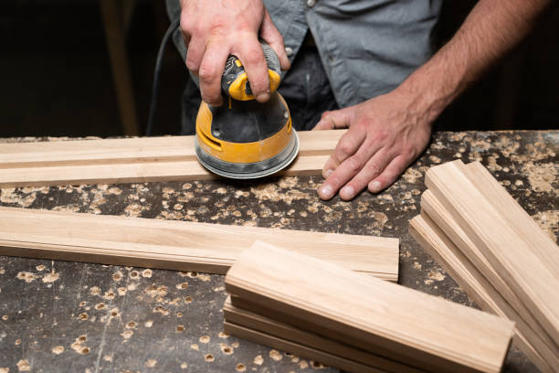 istock The carpenter grinds with a circular grinder 2177485673