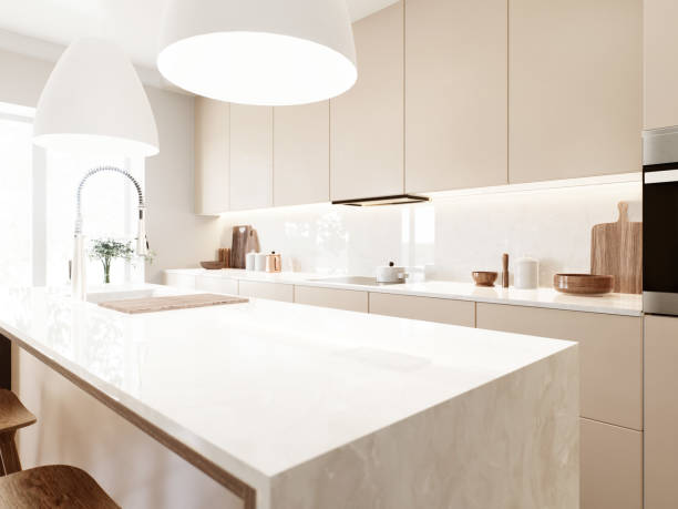 istock Modern minimalist kitchen. Beige glossy cabinets, large white quartz countertop 2177487496