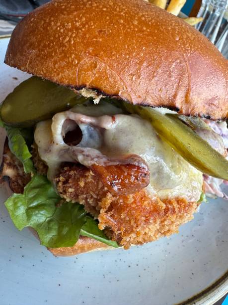 istock Gourmet Fried Chicken Burger with Pickles and Cheese 2177489208