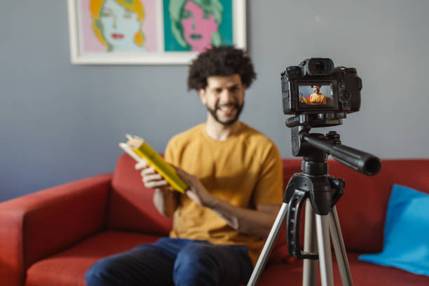 istock Hispanic man recording video for his vlog 2177493450