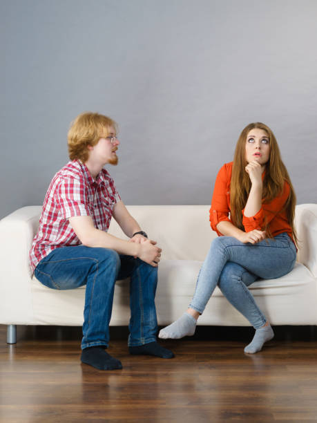 istock Woman and man after argue on sofa 2177493904