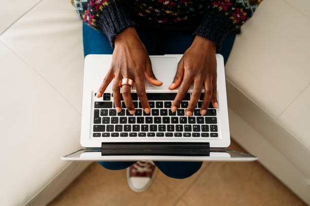 istock A person is working with a laptop in a cozy home, engaged in various technologyrelated tasks 2177497858