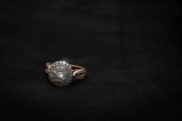 istock Rose Gold and Diamond Engagement Ring on Black Background 2177500450