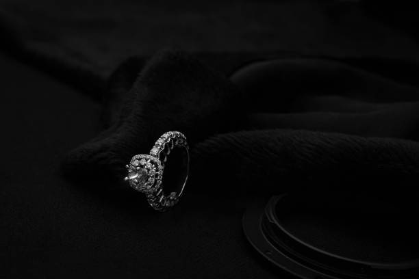 istock Elegant Gold Diamond Ring on Black Background 2177500604