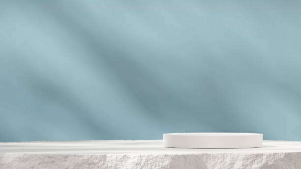 istock 3d rendering mockup of white cylinder podium in landscape with minimal light blue background 2177501134