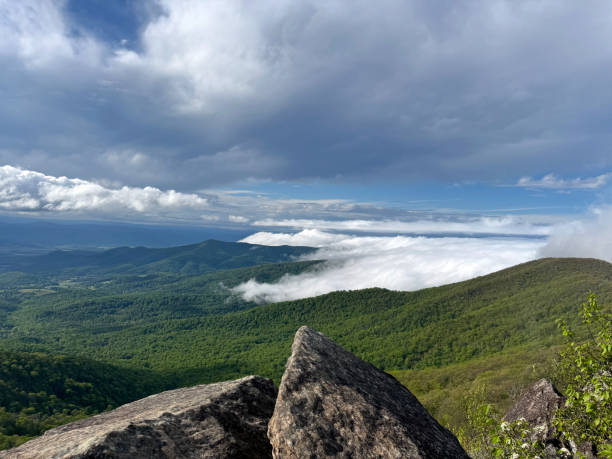 istock View of valley and clouds from a Mountain 2177503533