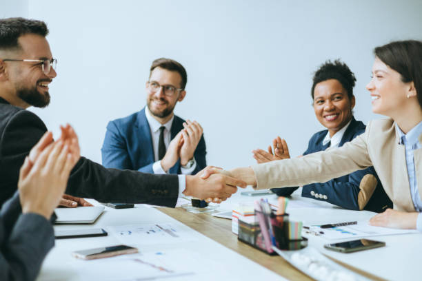 istock Colleagues applauding during a business meeting 2177508048