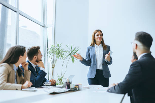 istock Professional presenting to colleagues at a meeting 2177508058