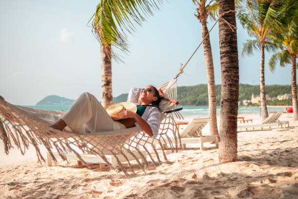 Relaxed Hispanic Woman Enjoying Beachside Hammock