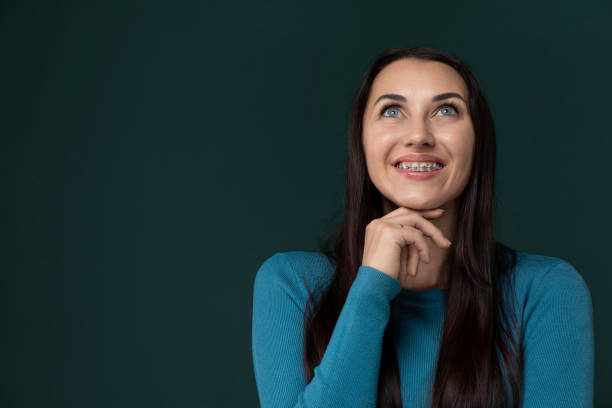 istock Smiling Woman in Blue Shirt 2177510030