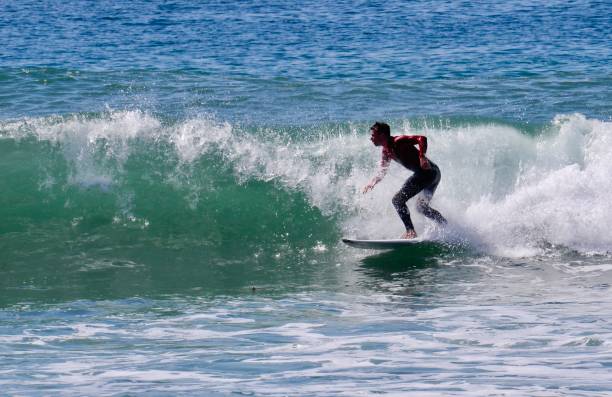 istock Surfer Racing to Catch Up with a Breaking Wave 2177512670