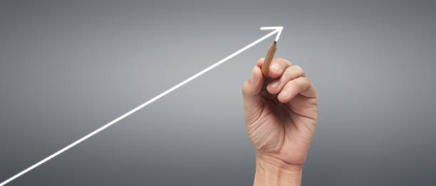 istock Male hand drawing graph chart showing business profit 2177514036