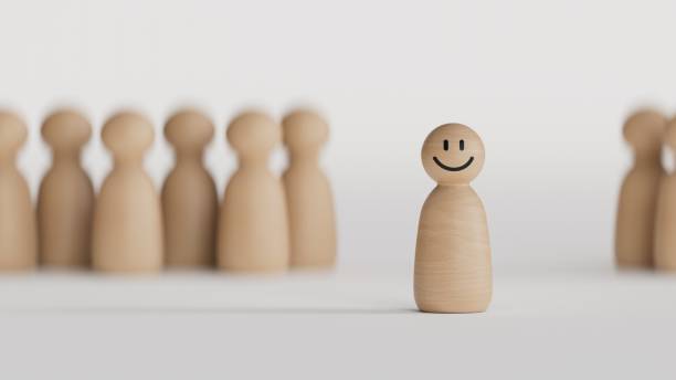 Happy wooden figure stands out from the crowd.3D rendering on black background.
