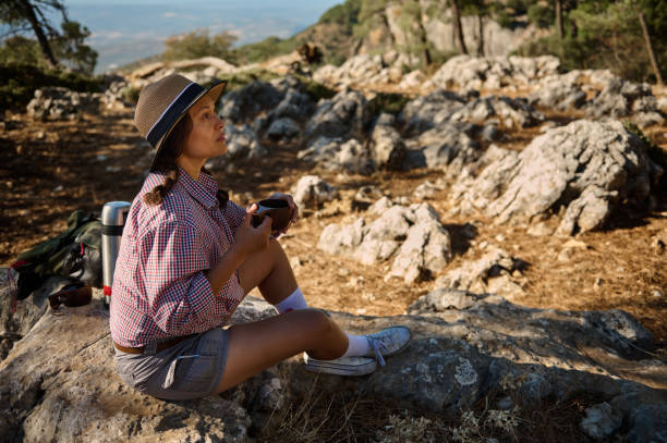 istock Woman Enjoying Coffee on a Mountain Hike 2177519869