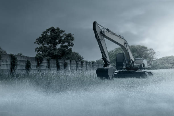 Heavy machinery against rural landscape