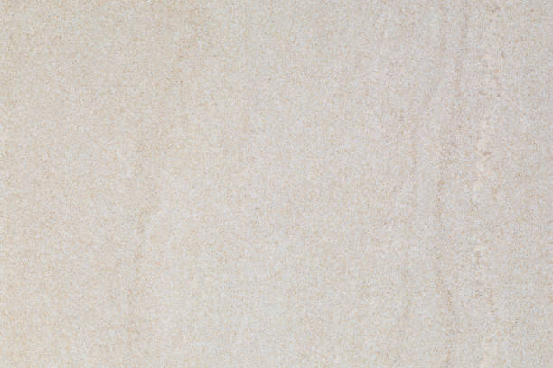 The polished granite surface background features a smooth, reflective finish with natural variations in color and pattern.