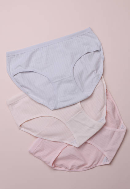istock Set of Women's comfortable panties on a beige pastel background 2177536178