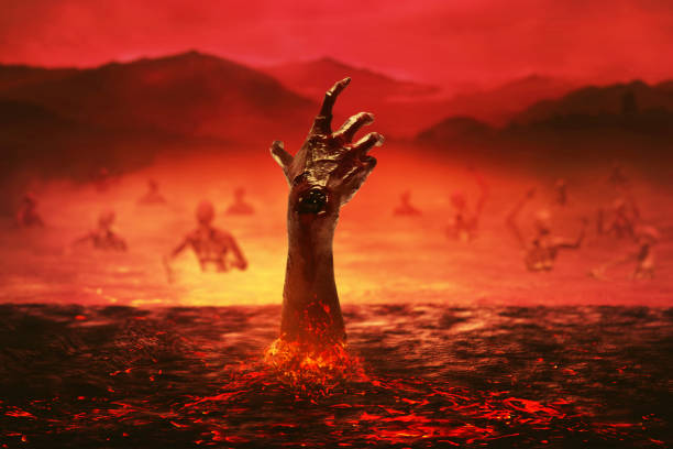 Burning hand rising out from hell with smoke mist fog, Religion concept