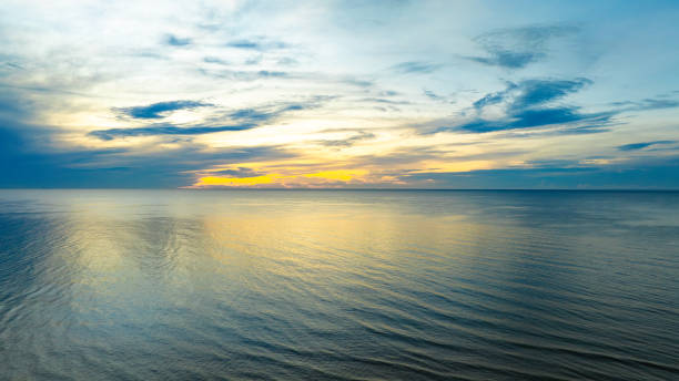 istock Skyline scenery Sunset in the evening sky with colorful clouds and beautiful cloud patterns In the soft light evening at the sea 2177539478