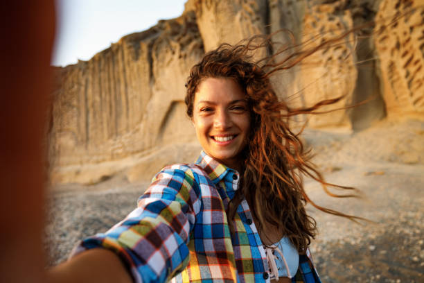 istock Happy woman taking a selfie in summer day. 2177544780